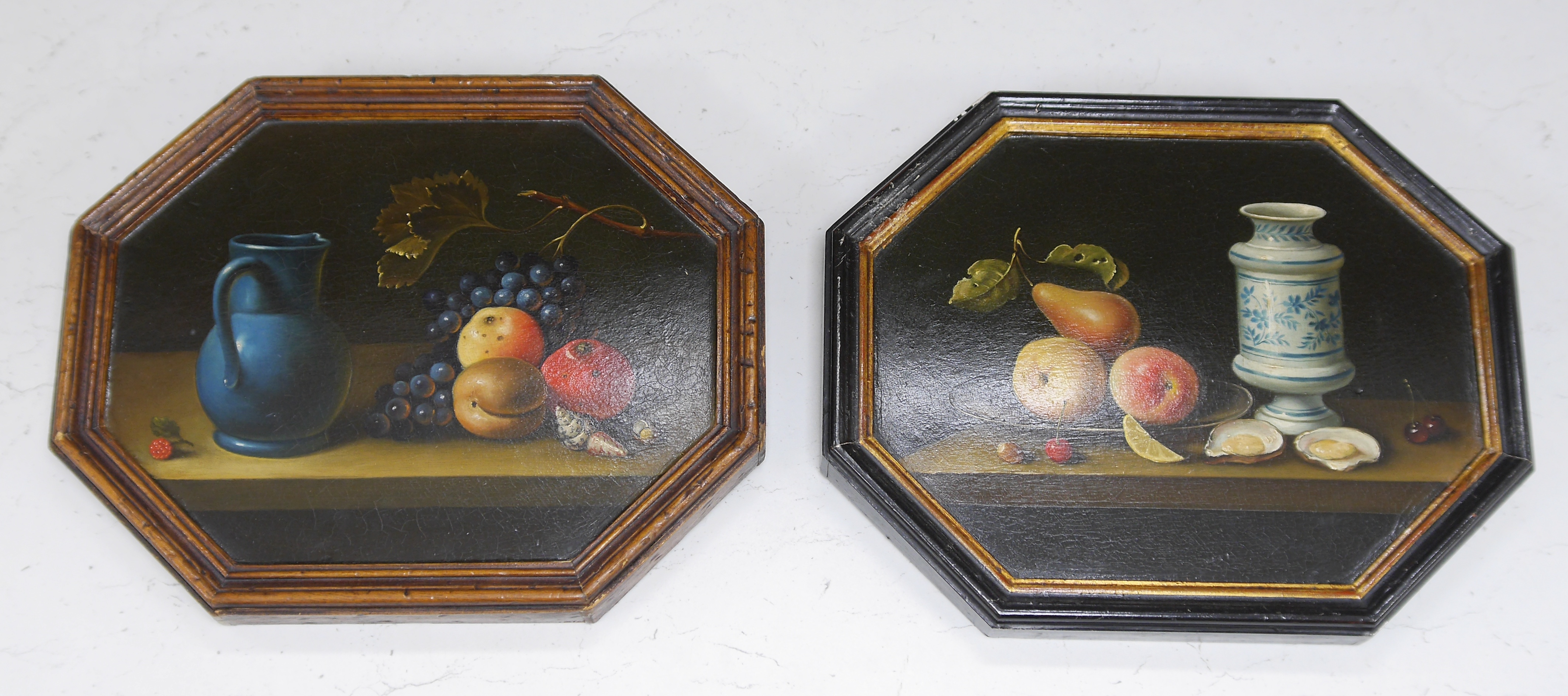 20th century, Dutch School, pair of octagonal oils on board, Still lifes of fruit and vessels, 21 x 27cm. Condition - fair to good